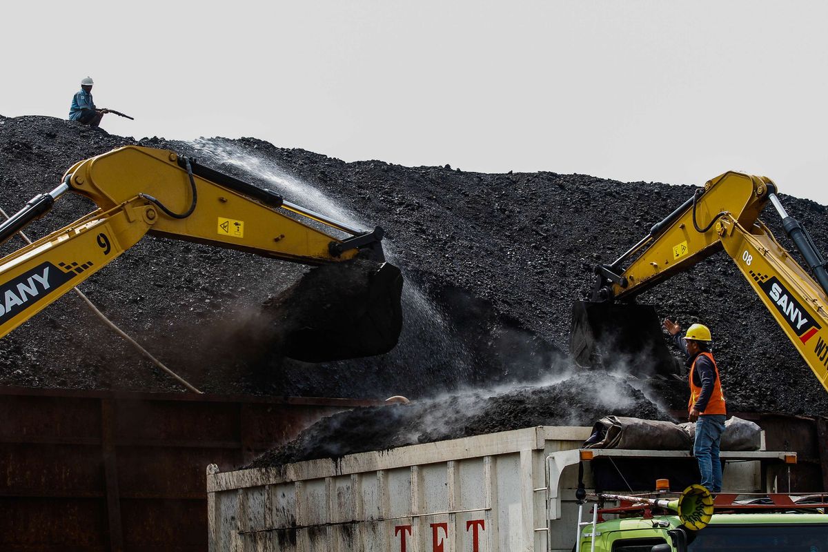 An activity of unloading coal in Tanjung Priok Port in North Jakarta on Monday, October 19, 2020. 