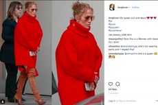 Berbalut Sweter Merah dan Bot Tinggi, J.Lo Tampil Tanpa Celana