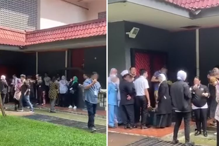 Tangkapan layar dari akun Facebook Info Semasa menunjukkan sekumpulan orang berkumpul untuk makan durian di luar gedung yang diyakini tempat vaksinasi di Johor, Malaysia.