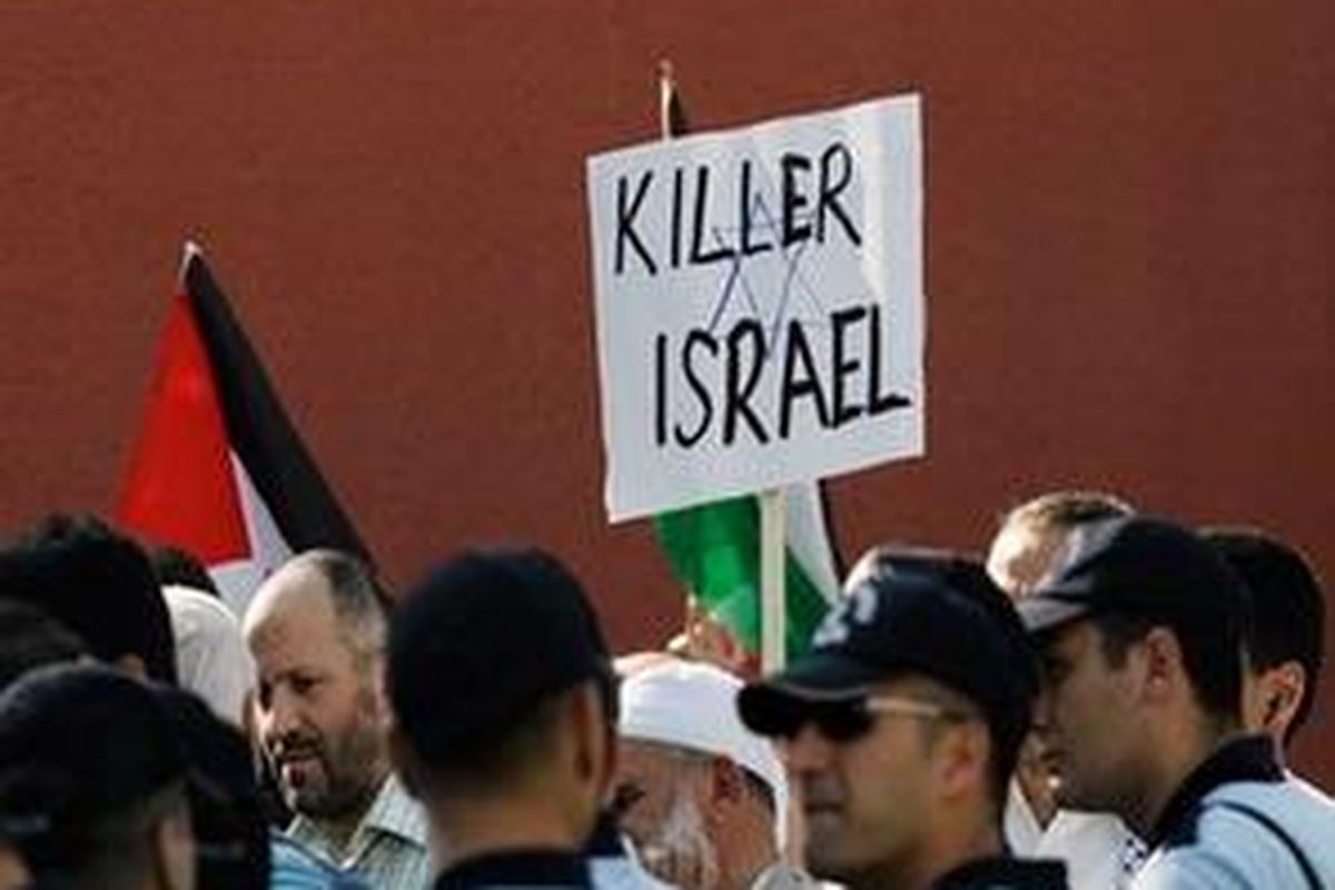 Riot police surround pro-Palestinian Turks protesting against Israel, at the entrance of Israeli ambassadors residence in Ankara, Turkey, Monday, May 31, 2010. The Israeli military says more than 10 pro-Palestinian activists have been killed after attacking naval commandos who were halting an aid flotilla heading toward the blockaded Gaza Strip.The army says the soldiers were attacked with knives and clubs as they boarded the six vessels Monday.