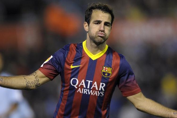 Gelandang Barcelona, Cesc Fabregas, merayakan golnya ke gawang Celta Vigo, pada lanjutan Liga BBVA, di  Estadio Balaidos, Selasa(29/10/2013). 