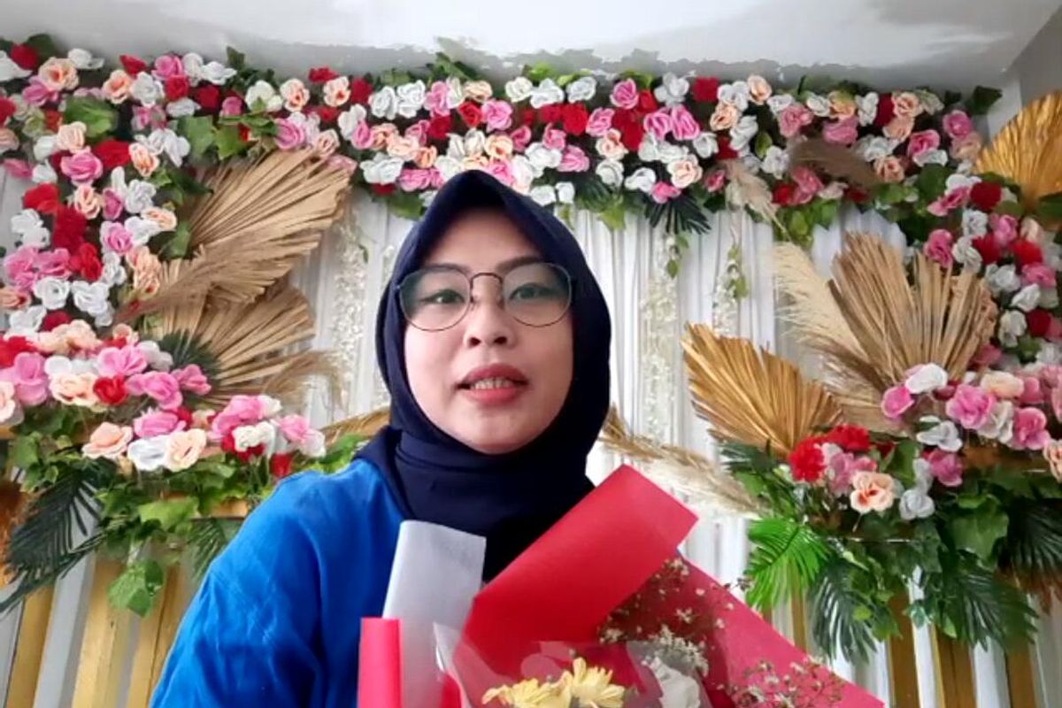 Aini Ummia, wartawati yang menikah virtual di Wisma Atlet saat diwawancara secara virtual, Sabtu (2/1/2021).