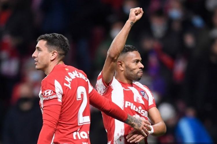 Renan Lodi (kanan) merayakan golnya bersama Jose Maria Gimenez pada pertandingan pekan ke-26 Liga Spanyol yang mempertemukan Atletico Madrid vs Celta Vigo di Stadion Wanda Metropolitano, Minggu (27/2/2022) dini hari WIB. Hasil Atletico Madrid vs Celta Vigo 2-0 untuk kemenangan tuan rumah.