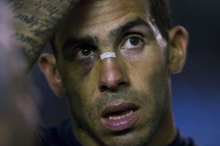 Penyerang Boca Juniors, Carlos Tevez, tampil pada laga kontra Racing Club di Stadion Juan Domingo Peron, pada 18 Oktober 2015.