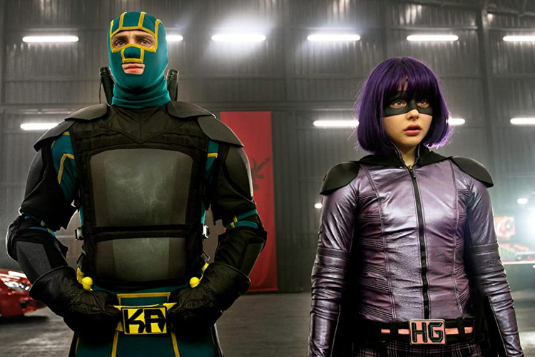 Aaron Taylor-Johnson dan Chloë Grace Moretz dalam film komedi superhero Kick-Ass 2 (2013).