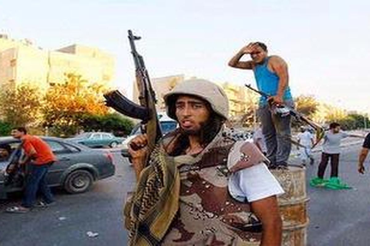 The fight goes on ... Libyan rebels in Tripoli.   