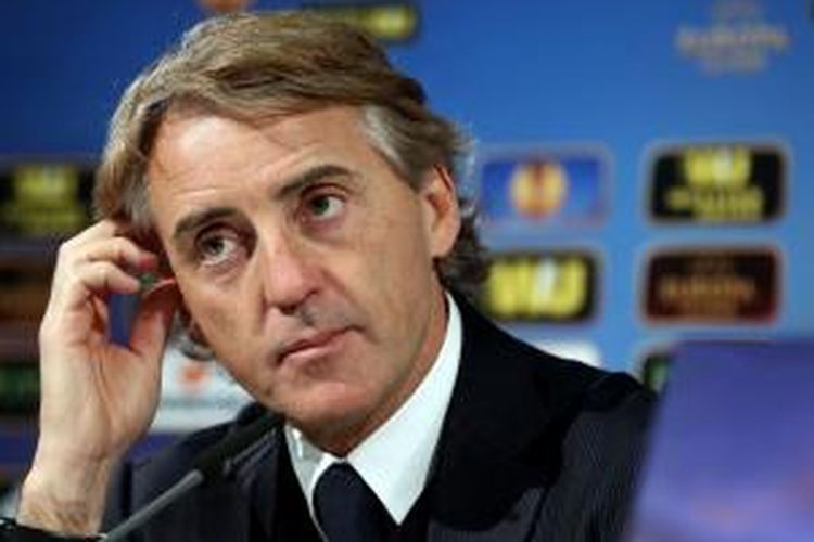 Pelatih Inter Milan, Roberto Mancini menjalan konferensi pers jelang laga kontra Wolfsburg di leg kedua babak 16-besar Europa League, Kamis atau Jumat (20/3/2015) dini hari WIB.