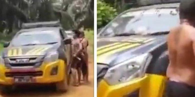 Potongan gambar video yang viral, memerlihatkan 3 orang pria bersenjata tajam mengadang mobil polisi di Lamandau, Kalimantan Tengah. Pengadangan ini terjadi setelah polisi menangkap 2 pelaku pencurian sawit.