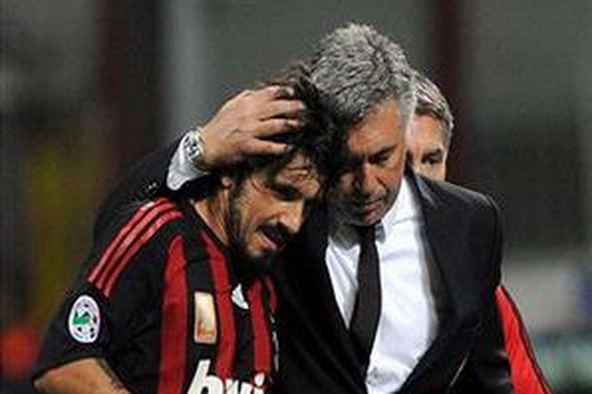 Gelandang AC Milan, Gennaro Gattuso (kiri) ingin kembali dilatih Carlo Ancelotti (kanan).