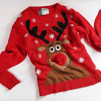 Ilustrasi sweater Natal berbahan wol.