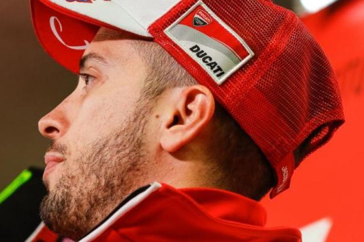 Pebalap Ducati asal Italia, Andrea Dovizioso, bereaksi saat menghadiri konferensi pers jelang GP Jepang di Sirkuit Twin Ring Motegi, Kamis (13/10/2016).