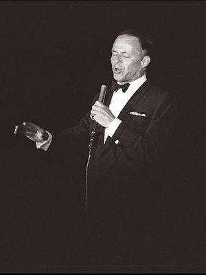 Legendary US singer Frank Sinatra in a picture taken 06 June 1962 in Paris performs on stage of the Lido Theater. (Photo by AFP)