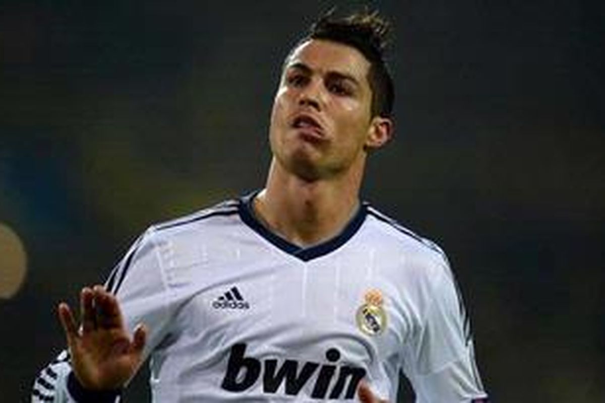 Ekspresi gelandang Real Madrid, Cristiano Ronaldo, setelah membobol gawang Borussia Dortmund, pada pertandingan ketiga Grup D, di Signal Iduna Park, Rabu (24/10/2012).