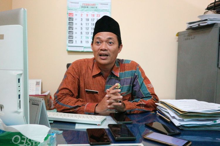 Mukti Ali, Kasi Penyelenggaraan Haji dan Umrah Kantor Kementerian Agama (Kemenag) Kabupaten Mojokerto, Jawa Timur, saat ditemui di kantornya, Kamis (27/2/2020).