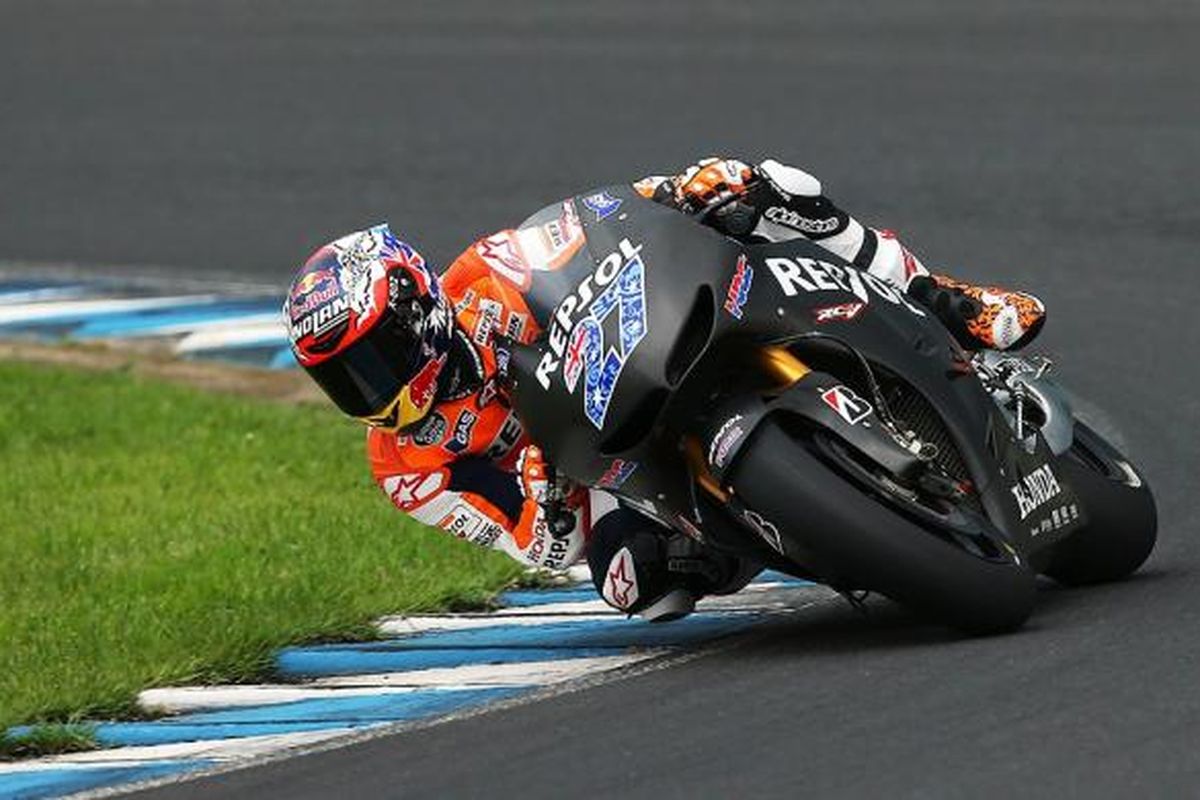 Pebalap Australia, Casey Stoner mamacu motor MotoGP Honda di Sirkuit Motegi, Jepang, dalam sesi uji coba, Selasa (6/8/2013).