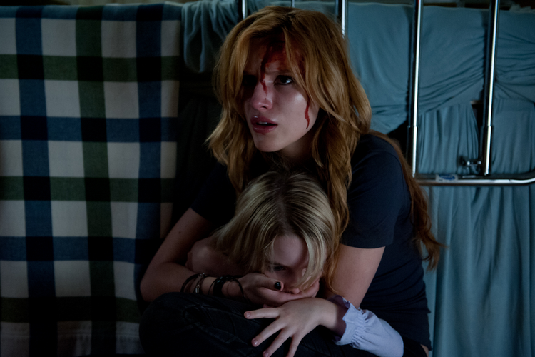 Bella Thorne and Mckenna Grace in Amityville: The Awakening (2017)