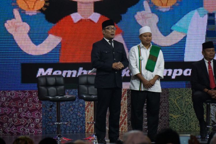 Pasangan calon Ridwan Kamil-Uu Ruzhanul Ulum dalam debat publik Pilgub Jabar terakhir, Jumat (22/6/2018).