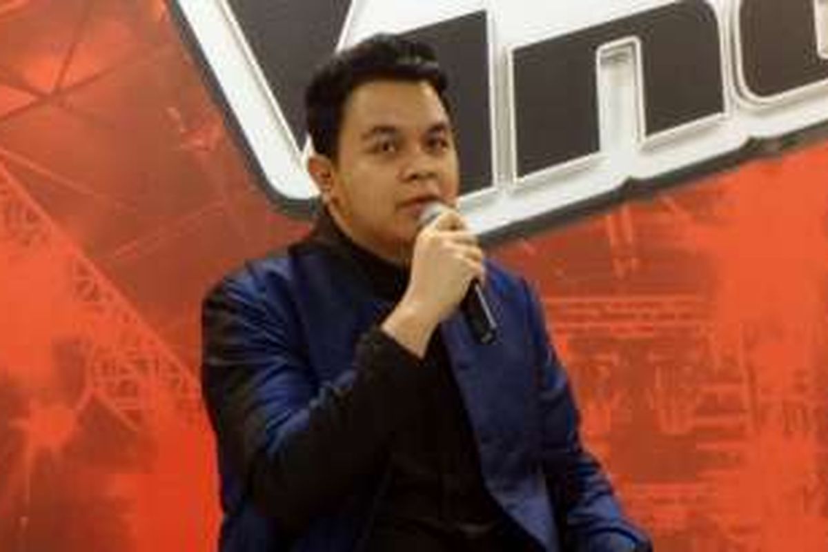 Vokalis Tulus saat diabadikan dalam jumpa pers The Voice Kids Indonesia di kawasab Kebon Jeruk, Jakarta Barat, Selasa (16/8/2016).