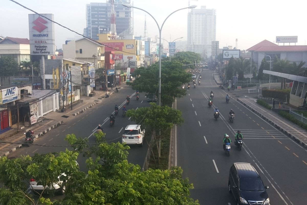 Kondisi Jalan Margonda, Depok saat penerapan sistem contra flow pada Senin (13/2/2017) pagi. Tampak ruas jalan terpantau lancar.