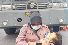 Foto Viral, Aipda Ismi Amankan Sengketa Pilkada Sambil Pangku Anaknya yang Tertidur