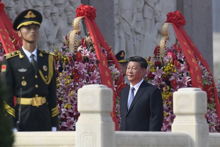 Presiden China Xi Jinping saat berada di lapangan Tiananmen, Senin (30/9/2019), menjelang perayaan memperingati Hari Nasional China Ke-70, yang akan digelar Selasa (1/10/2019).
