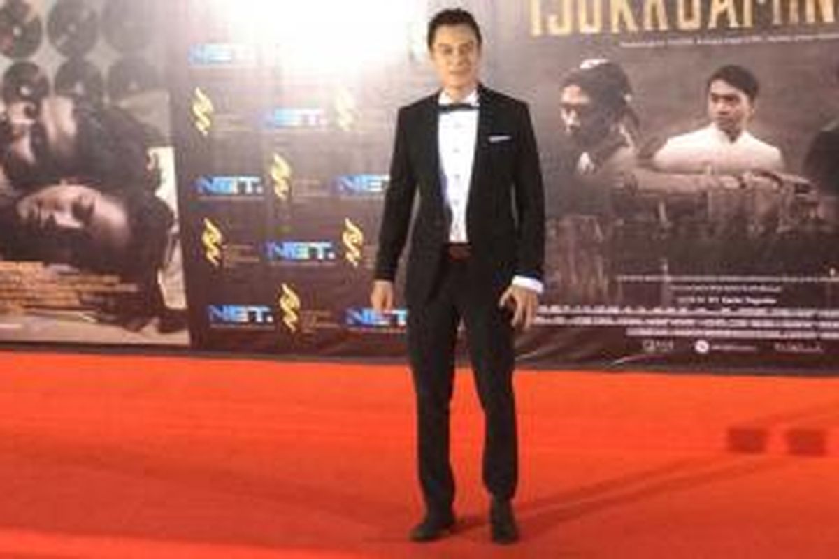 Baim Wong diabadikan di karpet merah FFI 2015 yang digelar di Indonesia Convention Exhibition (ICE) BSD City, Tangerang, Banten, Senin (23/11/2015) malam.