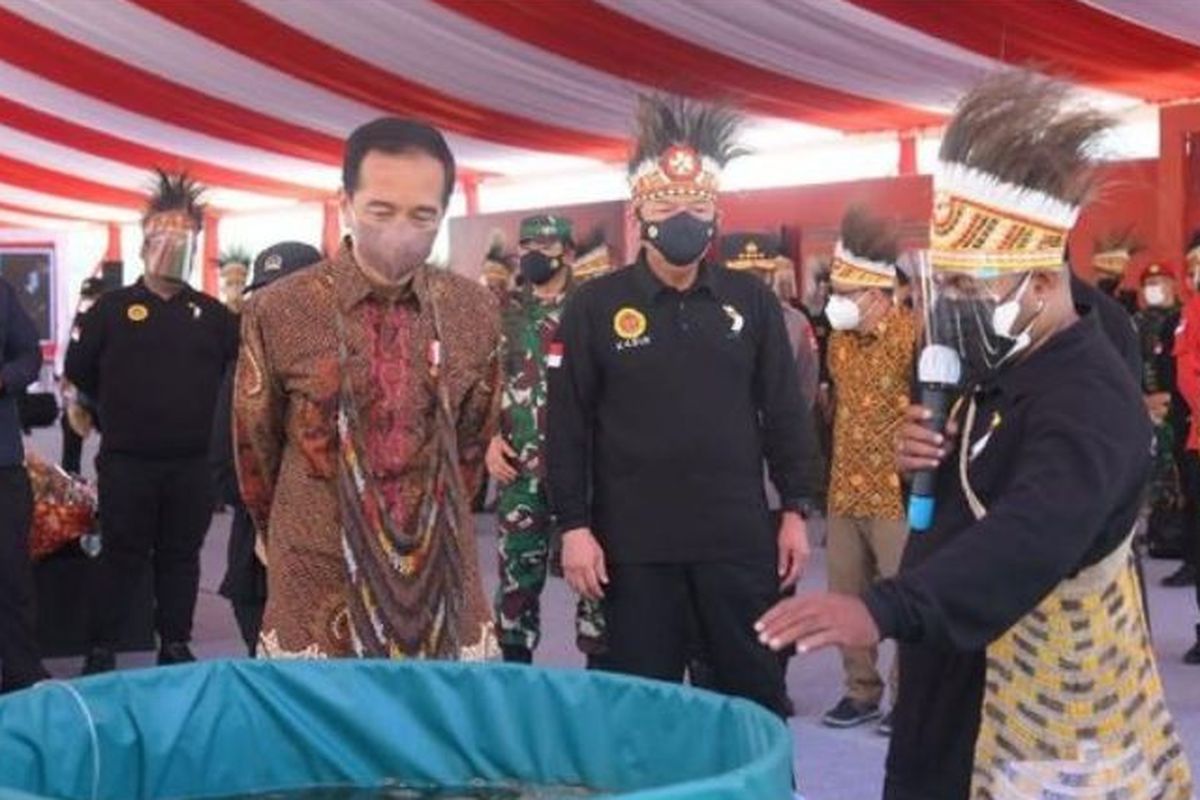 Indonesia's President Joko Widodo (third, right) during a groundbreaking ceremony of Papua Youth Creative Hub in Jayapura.  