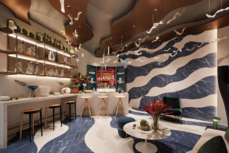 Desain dinamis, modern, dan elegan, desainer interior Anita Boentarman mengusung tema  "Tide and Tiki Bar ". Menggunakan slab besutan Quadra, Anita membawa nuansa lautan Indonesia. 