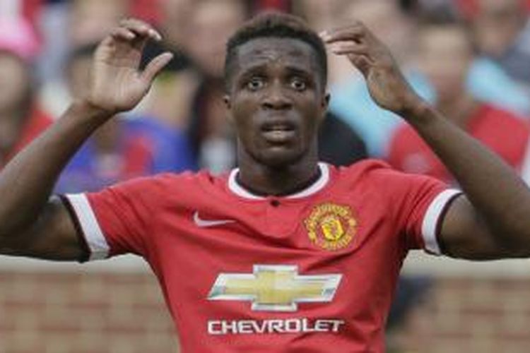 Penyerang Wilfried Zaha meninggalkan Manchester United dan bergabung dengan Crystal Palace secara permanen, pada Senin (2/2/2015).