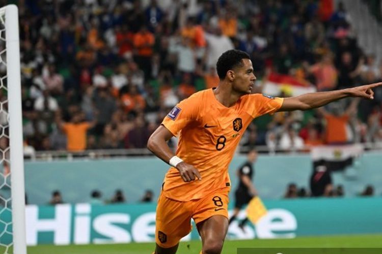 Penyerang timnas Belanda Cody Gakpo merayakan golnya ke gawang Senegal pada laga matchday pertama Grup A Piala Dunia 2022 di Stadion Al Thumama, Doha, Qatar, Senin (21/11/2022) malam WIB.