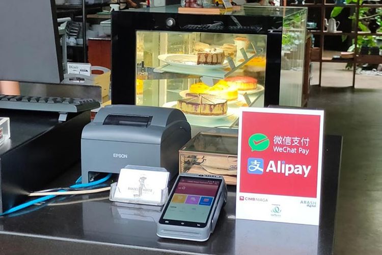 Transaksi QR inbound cross border dari dompet digital AliPay dan WeChat Pay oleh CIMB Niaga. 