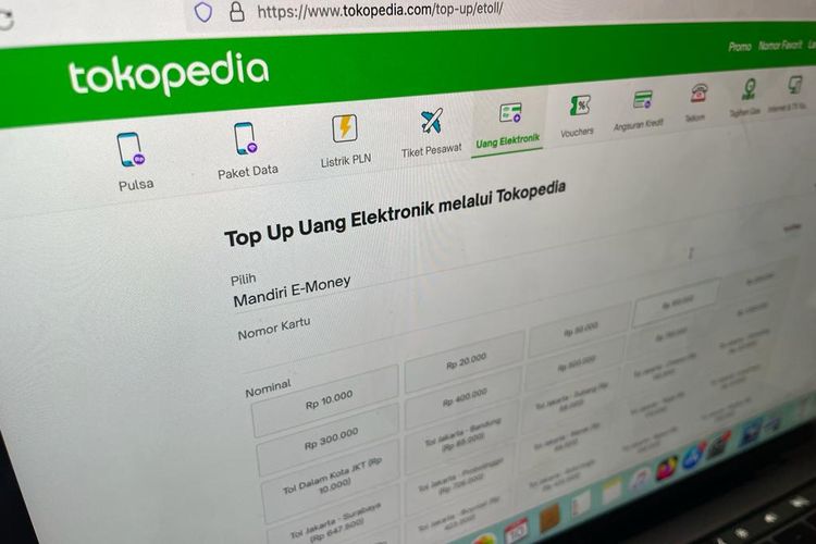 Ilustrasi cara top up e-toll di Tokopedia buat perjalanan mudik Lebaran 2023.