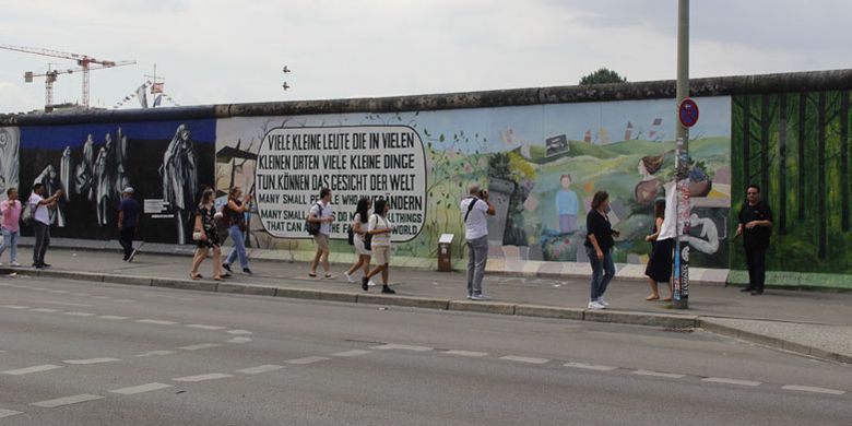 Tembok Berlin, Rabu (20/6/2018), merupakan salah satu destinasi wisata yang wajib didatangi turis di kota Berlin, Jerman.