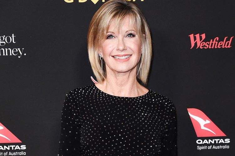 Olivia Newton-John seorang penyanyi sekaligus aktris.