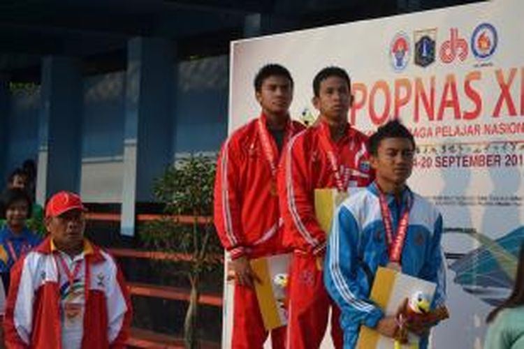 Dua atlet DKI yang menjadi juara bersama di ajang Popnas XII/2013,  Gagarin Nathaniel dan Ilham Ahmad