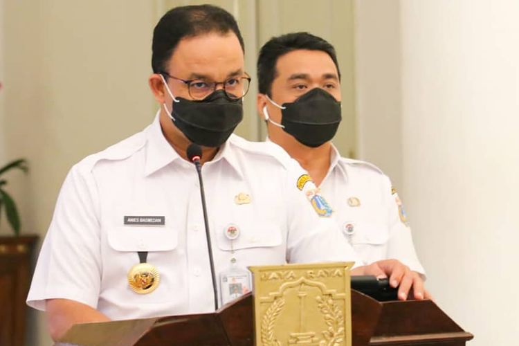 Jakarta Governor Anies Baswedan (left) and Deputy Governor Achmad Riza Patria, announces his decision to reimpose partial lockdown from September 14 to stem the spread of the Covid-19 in the Indonesian capital. 