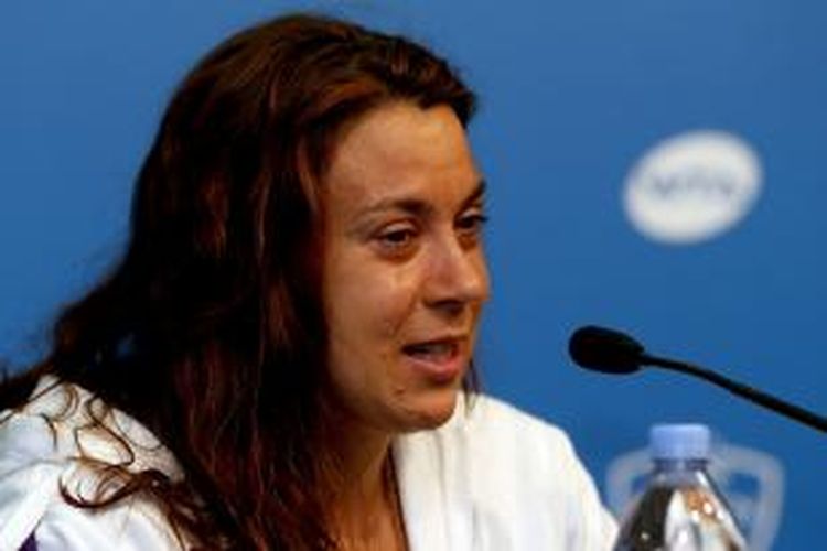 Petenis Perancis, Marion Bartoli, mengumumkan pengunduran dirinya dari tenis profesional dengan mencucurkan air mata, pada konferensi pers setelah pertandingan babak kedua Western & Southern Open di Cincinnati, Rabu (14/8/2013).