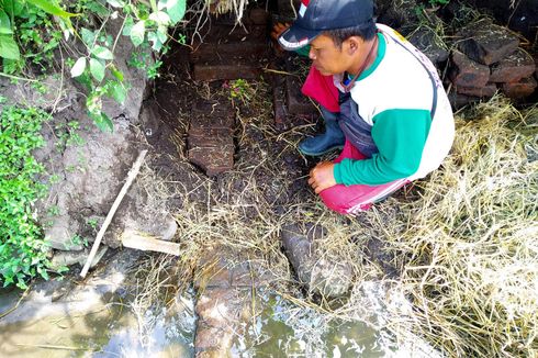 Tanah Tergerus Air Irigasi, Struktur Diduga Bangunan Kuno Muncul di Persawahan