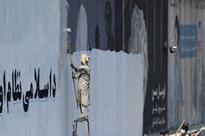 Taliban Hapus Mural Warna-warni yang Hiasi Tembok Kabul, Diganti Tulisan Slogan Hitam Putih