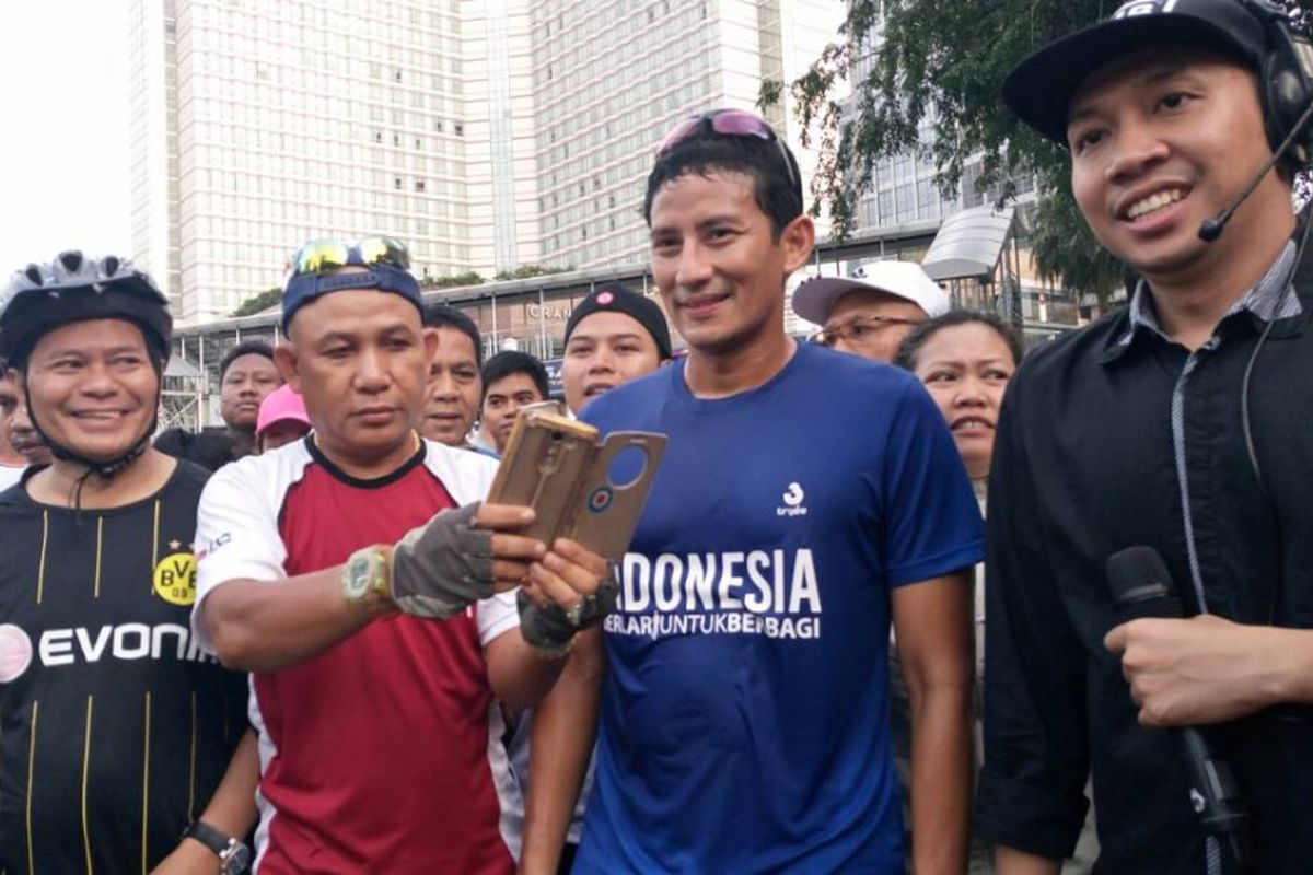 Calon wakil gubernur DKI Jakarta Sandiaga Uno di Bundaran HI, Jakarta Pusat, Minggu (23/4/2017)