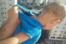 Pria Ini Ayun Bayi di Luar Jendela Lantai 15 demi Like di Facebook