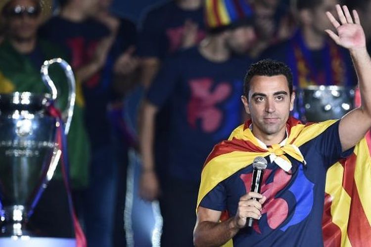 Xavi Hernandez kala merayakan keberhasilan Barcelona meraih gelar Liga Champions di Stadion Camp Nou, pada 7 Juni 2015.