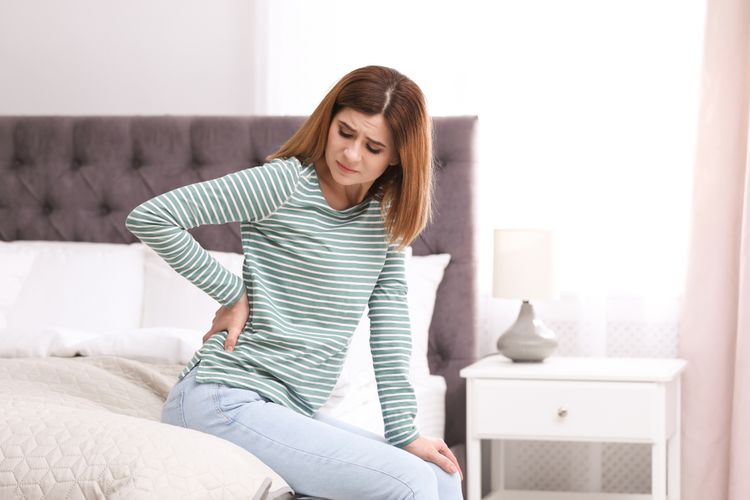 Pramenstruasi (PMS) adalah salah satu penyebab sakit punggung pada wanita.