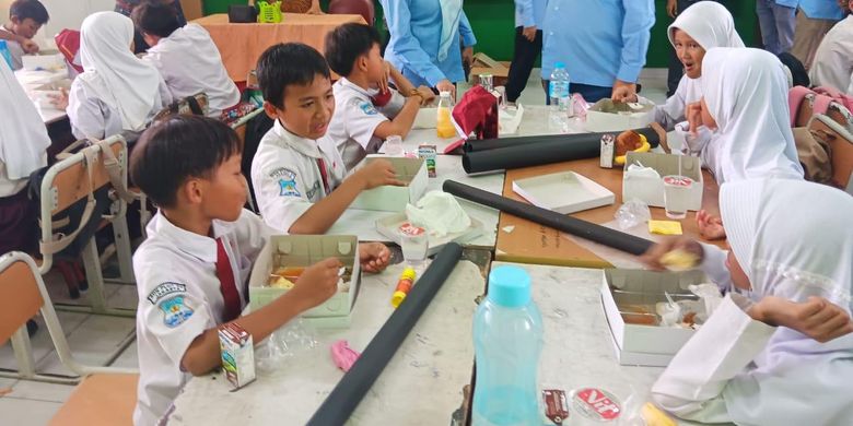Ilustrasi makan bergizi gratis. Syarat dan cara jadi vendor makan bergizi gratis. Program makan bergizi gratis.