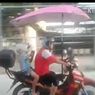 Berbahaya, Jangan Bawa Payung Sambil Berkendara Motor