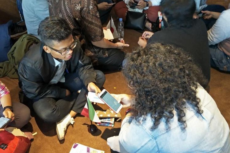 Suasana Kegiatan Komunitas Polyglot Indonesia di Plaza Sudirman, Jakarta Pusat, Sabtu (13/7/2019).