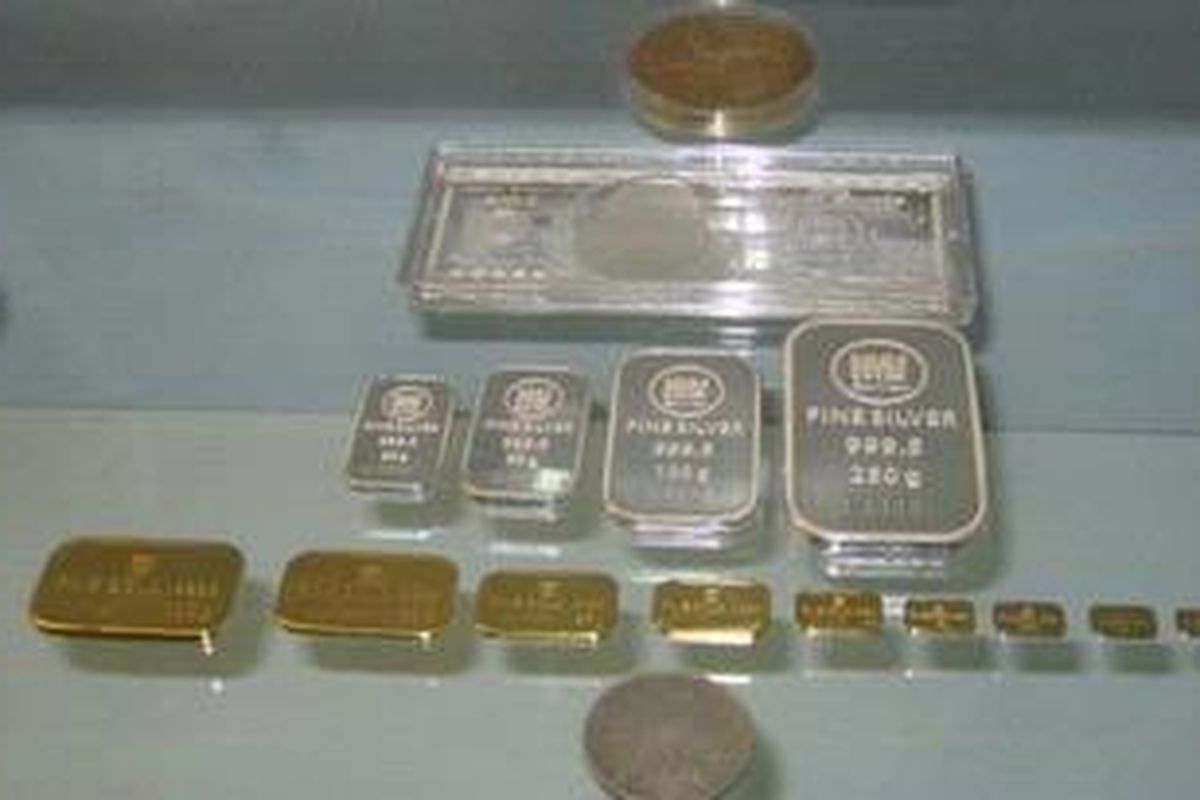 Batangan emas dan perak sebagai alat investasi.