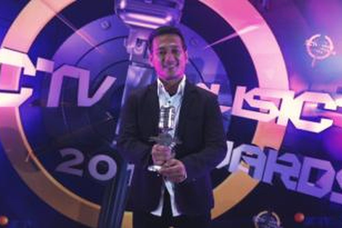 Pemain keyboard Ricky dari band Five Minutes mendapat penghargaan Pemain Keyboard Paling Ngetop versi SCTV Awards, di Hall D JIExpo, Kemayoran, Jakarta Pusat, Kamis (17/4/2014) malam.