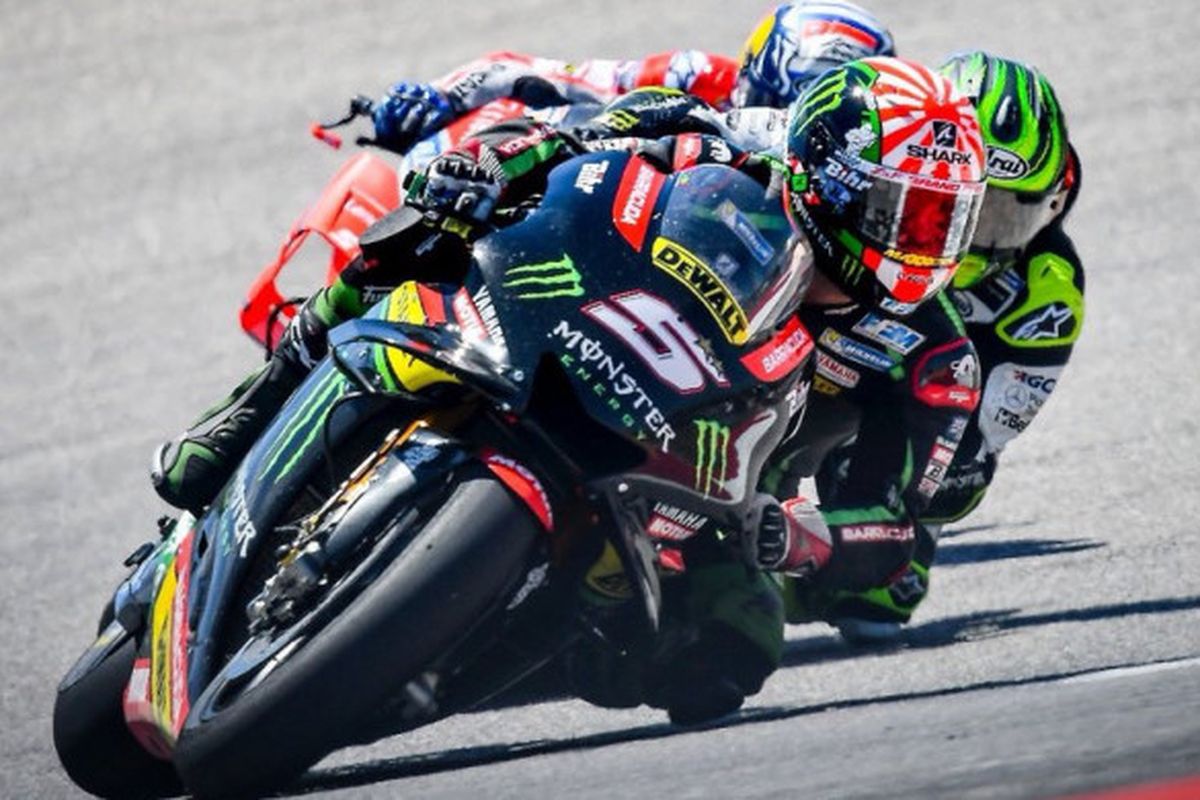 Johann Zarco berada di depan Cal Crutchlow dan Andrea Dovizioso saat GP Americas.
