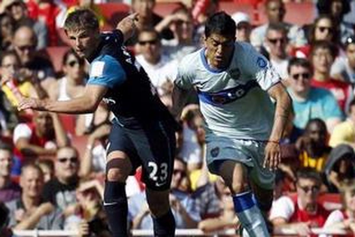 Laga Arsenal melawan Boca Juniors di Stadion Emirates, Sabtu (30/7/2011).